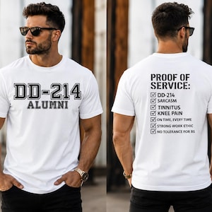 May include: A white short-sleeved t-shirt featuring black text on the front reading DD-214 ALUMNI. The back displays the text PROOF OF SERVICE: followed by a checklist including DD-214, SARCASM, TINNITUS, KNEE PAIN, ON TIME, EVERY TIME, STRONG WORK ETHIC, and NO TOLERANCE FOR BS.