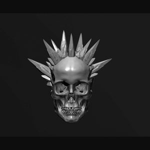 May include: A silver skull sculpture with a spiky, crystal-like mohawk.