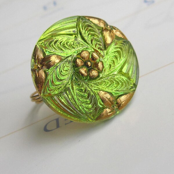 Wire wrap ring, Czech glass button, green and gold