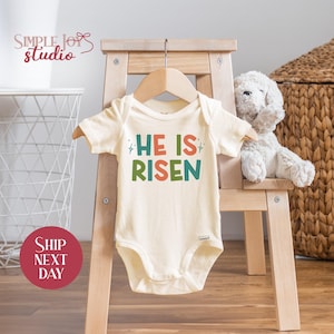 He Is Risen Baby Onesie®: Christian Easter Outfit