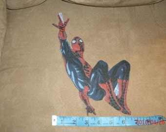 May include: A red and blue Spiderman character illustration with black webbing. The character is in a crouching pose with one arm raised. The illustration is approximately 6 inches tall.