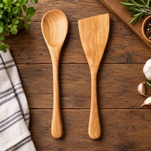 May include: A light brown wooden spoon and a matching flat wooden spatula with a straight edge. Both kitchen utensils feature a smooth, natural grain finish and long, slender handles, presented together as a set for food preparation tasks.