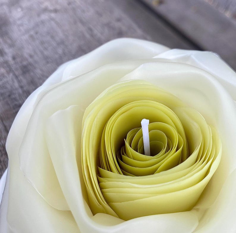 White rose petal candle, a realistic flower shaped candle crafted from beeswax, perfect for weddings and eco-friendly decor.