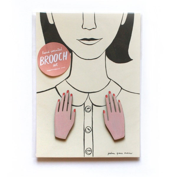 par de broches de mano pintados a mano