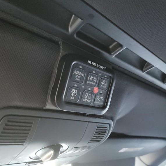 955/957 Porsche Cayenne Captain Switch Panel Mount (fits Auxbeam