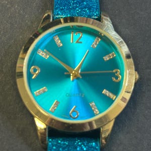 Fashion Fun! Ladies Teal glitter watch image 1