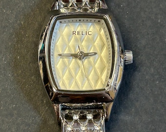 Ladies Relic by Fossil Rare diamond cut style watch