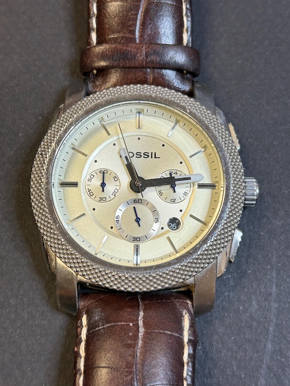 Fossil Machine On Leather Gem