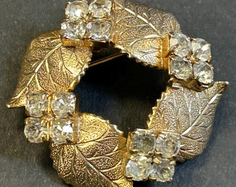 Spilla vintage con foglie e strass anni '60