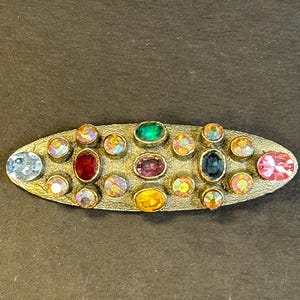Broche Art déco en strass multicolores 1950