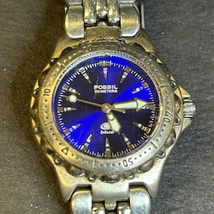 Ladies Fossil Blue 100 Meter Silver Tone Watch