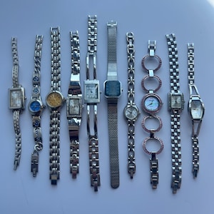 10 Silver toned watches, sold separately