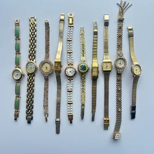 10 gold toned watches, sold separately