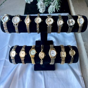 15 gold and mixed metal expansion/stretch band watches, sold separately