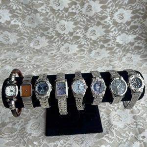 Womens silver toned watches, sold separately