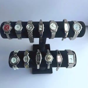 13 Silver toned watches, sold separately
