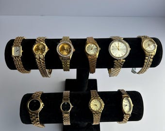 10 gold toned watches, sold separately