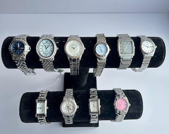 10 silver toned watches, sold separately