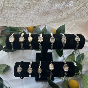 12 gold and silver watches, sold separately