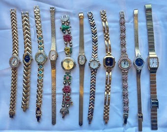 11 gold toned watches, sold separately