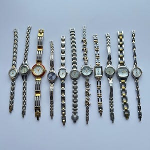 11 gold and silver two toned/mixed metal watches - Pick one