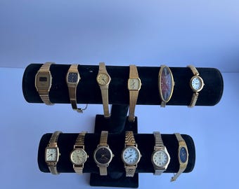 12 gold toned womens watches, sold separately