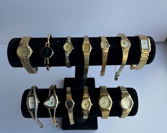 13 gold toned womens watches, sold separately