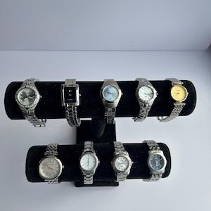 9 silver toned watches, sold separately