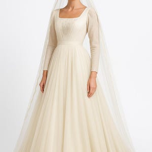 Ivory Long Sleeve Wedding Dress with Veil—Elegant Lace Hem A-Line Bridal Gown—Vintage-Inspired Full Skirt Embroidered Dress