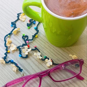Lanière de lunettes et lacet de lunettes