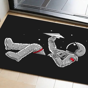 Wycieraczka astronauta, minimalistyczna wycieraczka, wycieraczka do pokoju nastolatka, popularna wycieraczka, fajna wycieraczka, dywanik antypoślizgowy, personalizowana wycieraczka, designerska wycieraczka