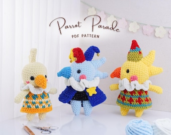 May include: Three colorful, crocheted parrot-themed dolls. The dolls are in yellow, blue, and cream colors, each with unique outfits and features. The text "Parrot Parade PDF Pattern" is displayed above the dolls.