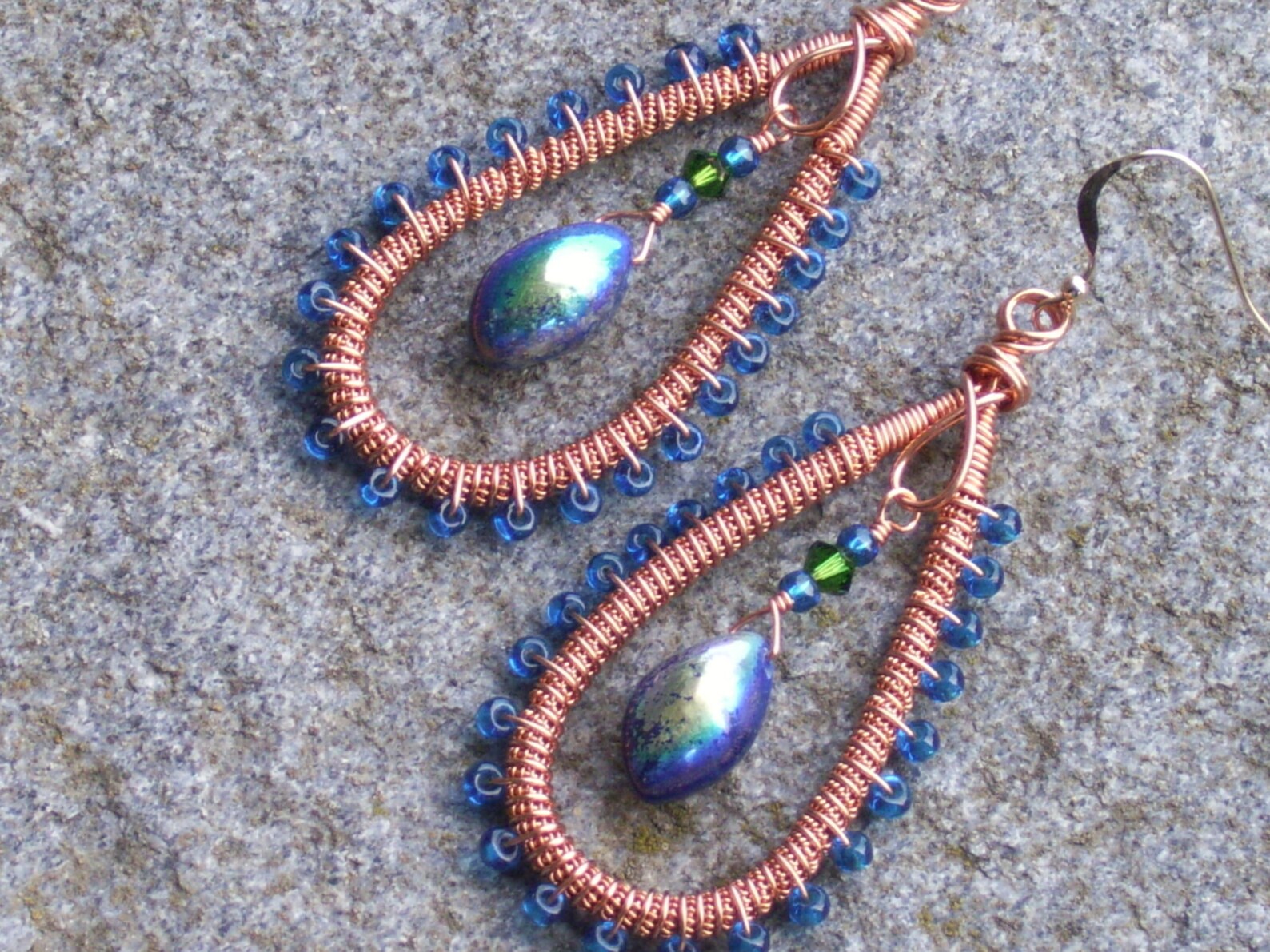 Copper Coiled Earrings With Deep Turquoise Colored Beads and Mystic