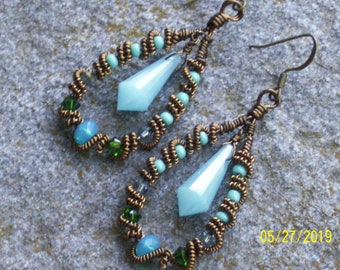 Bronze wire wrapped earrings with blue and green crystals and beads and stunning turquoise crystal briolettes