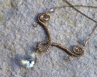 Bronze swirl necklace with Sage Green Quartz and intricate wire weaving