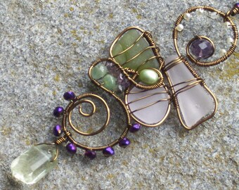 Bronze swirl in sea greens, purple, and lavender    sea glass, aquamarine, green amethyst, moss agate, pearl