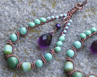 Antique copper wire wrapped earrings with turquoise gems and beads and purple crystal briolette