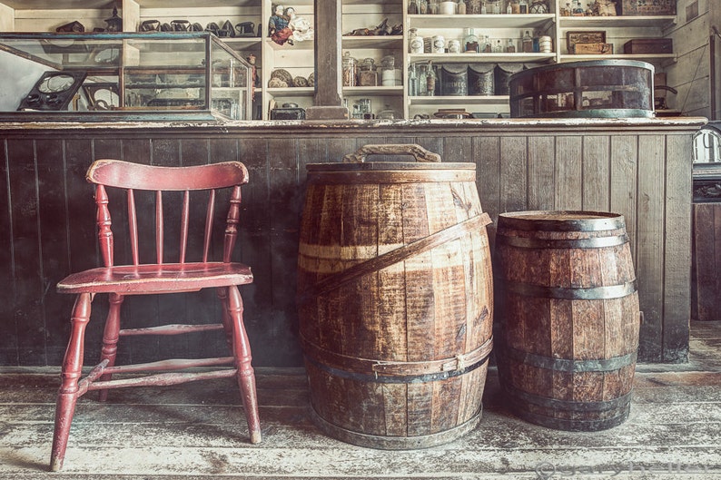 A Red Wooden Chair and Barrels in the Old General Store, 19th Century Variety store, Everything for all your needs, Photography Print image 1