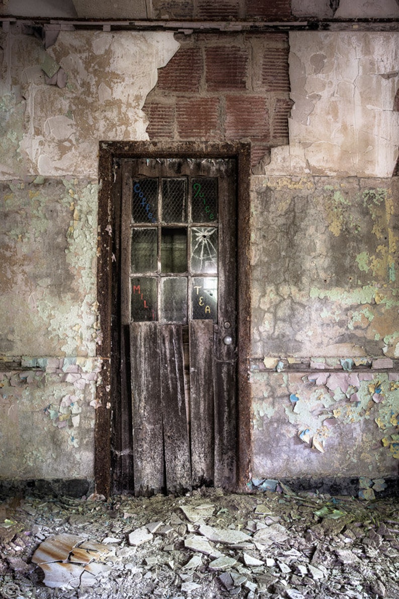 Old Door in an Abandoned Building Leading to a Room That Served