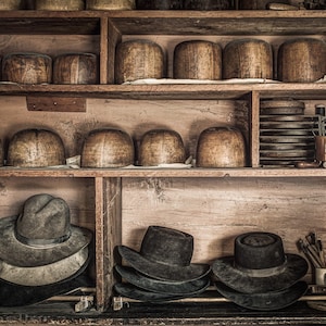 Hats and Things on shelves of a 19th Century Hatters Shop, Hat Molds and Tools, Old World Vintage Styled Photograph, signed.