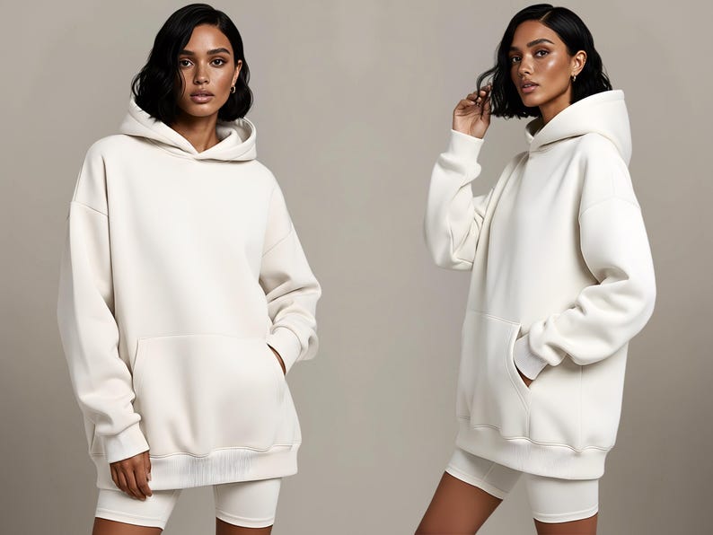 May include: Two images of a person wearing a cream-colored hoodie with a kangaroo pocket and matching shorts. The hoodie has a drawstring hood and ribbed cuffs and hem. The outfit is a casual, comfortable style.