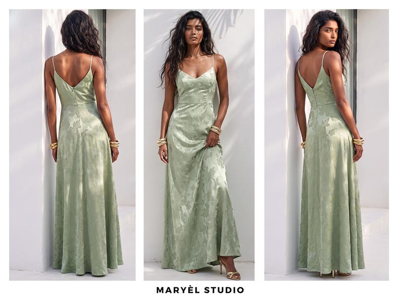May include: A light green, floor-length dress with spaghetti straps and a V-neck. The dress has a subtle floral pattern and a flowing skirt. The model is wearing gold bracelets and heels. The text "MARY&Egrave;L STUDIO" is at the bottom.