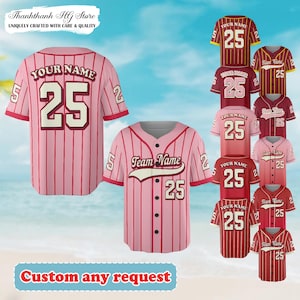 May include: Pink baseball jerseys with vertical stripes, featuring "Your Name" and the number 25. A variety of red and pink jerseys are displayed, each with "Team Name" and the number 25. The text "Custom any request" is also visible.