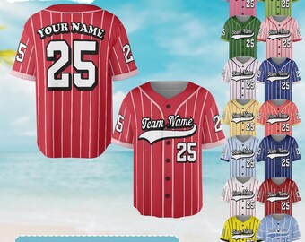 May include: A collection of baseball jerseys in various colors, including red, pink, green, and blue. Each jersey features a team name, number 25, and the option to customize with a name. The jerseys have vertical stripes and are displayed against a blue background.