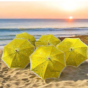 Traditional Indian umbrella in bright yellow, perfect for Haldi rituals and wedding decorations