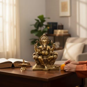 Product promotional image: Handcrafted 9.5” Brass Ganesha Statue, antique gold finish — gift & temple us