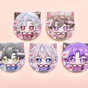 May include: Five cat-shaped enamel pins with anime-style characters in various hair colours. Each pin shows a character holding a teacup, surrounded by hearts and the word "meow". The pins have a glossy finish against a light pink background.