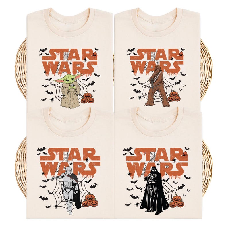 four white t-shirts with various Star Wars characters printed on them, including Yoda, Chewbacca, Darth Vader, and Baby Yoda.