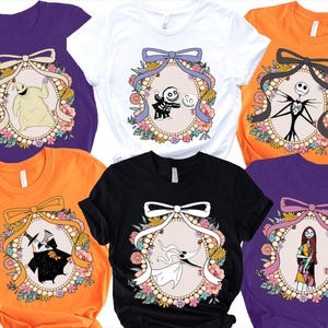 a collection of t-shirts featuring various Halloween-themed designs, including characters from the movie "The Nightmare Before Christmas".