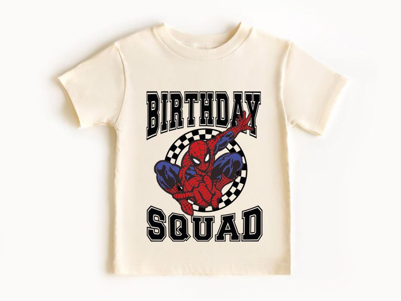 A white t-shirt with a graphic design featuring a Spider-Man character and the text "BIRTHDAY SQUAD" printed on it.